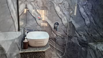 Shower, towels, soap, shampoo