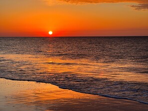 On the beach, sun-loungers, beach towels