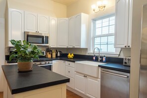 Fridge, microwave, oven, dining tables