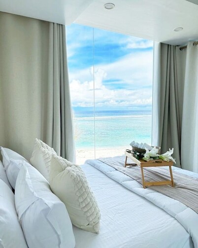 Lazzlla 1BR beachfront oceanview apartment