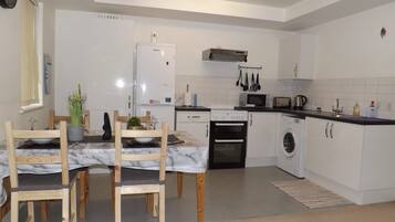 Apartment | Private kitchen | Fridge, microwave, oven, stovetop