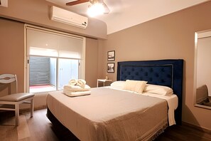 2 habitaciones, tabla de planchar con plancha y ropa de cama 