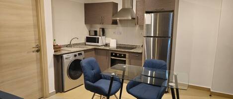 Appartement, 1 queensize bed, kitchenette | 1 slaapkamer, een strijkplank/strijkijzer, gratis wifi