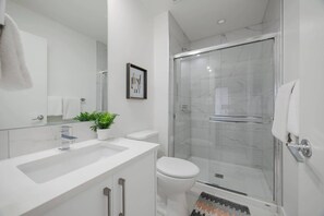 Shower, hair dryer, towels