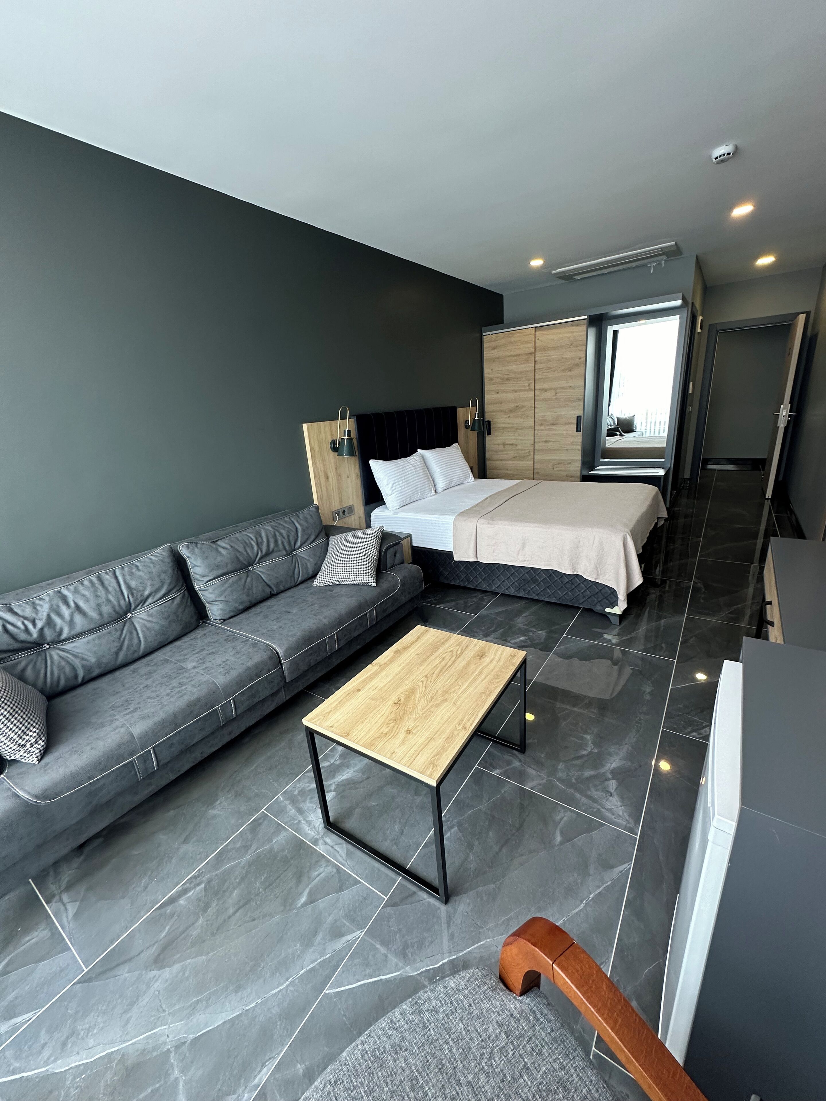 Egyptian cotton sheets, premium bedding, down duvets, laptop workspace