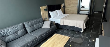 Egyptian cotton sheets, premium bedding, down duvets, laptop workspace