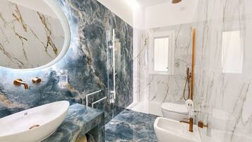 Deluxe Double Room, Non Smoking, Balcony | Bathroom | Designer toiletries, hair dryer, slippers, bidet