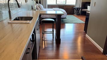 Executive Studio Suite, City View | Private kitchen | Full-size fridge, microwave