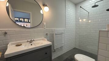 Hair dryer, towels, soap, toilet paper