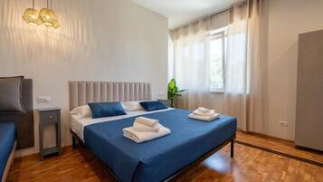 Camera Deluxe, vista città | Biancheria da letto di alta qualità, copriletto in piuma