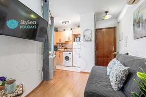 Departamento familiar | Área de sala de estar | Televisión de pantalla plana de 40 pulgadas con canales digitales 