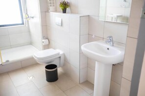 Shower, towels, soap, shampoo
