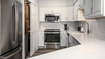 Condo, Multiple Beds, Balcony, Garden View (The Overbrook) | Private kitchen | Fridge, microwave, oven, stovetop