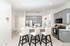 House, Multiple Beds, Pool Access, Pool View (Home Away From Bridgeford Crossing) | Private kitchen | Fridge, microwave, oven, stovetop - Home Away From Home At Bridgeford Crossing (Davenport)