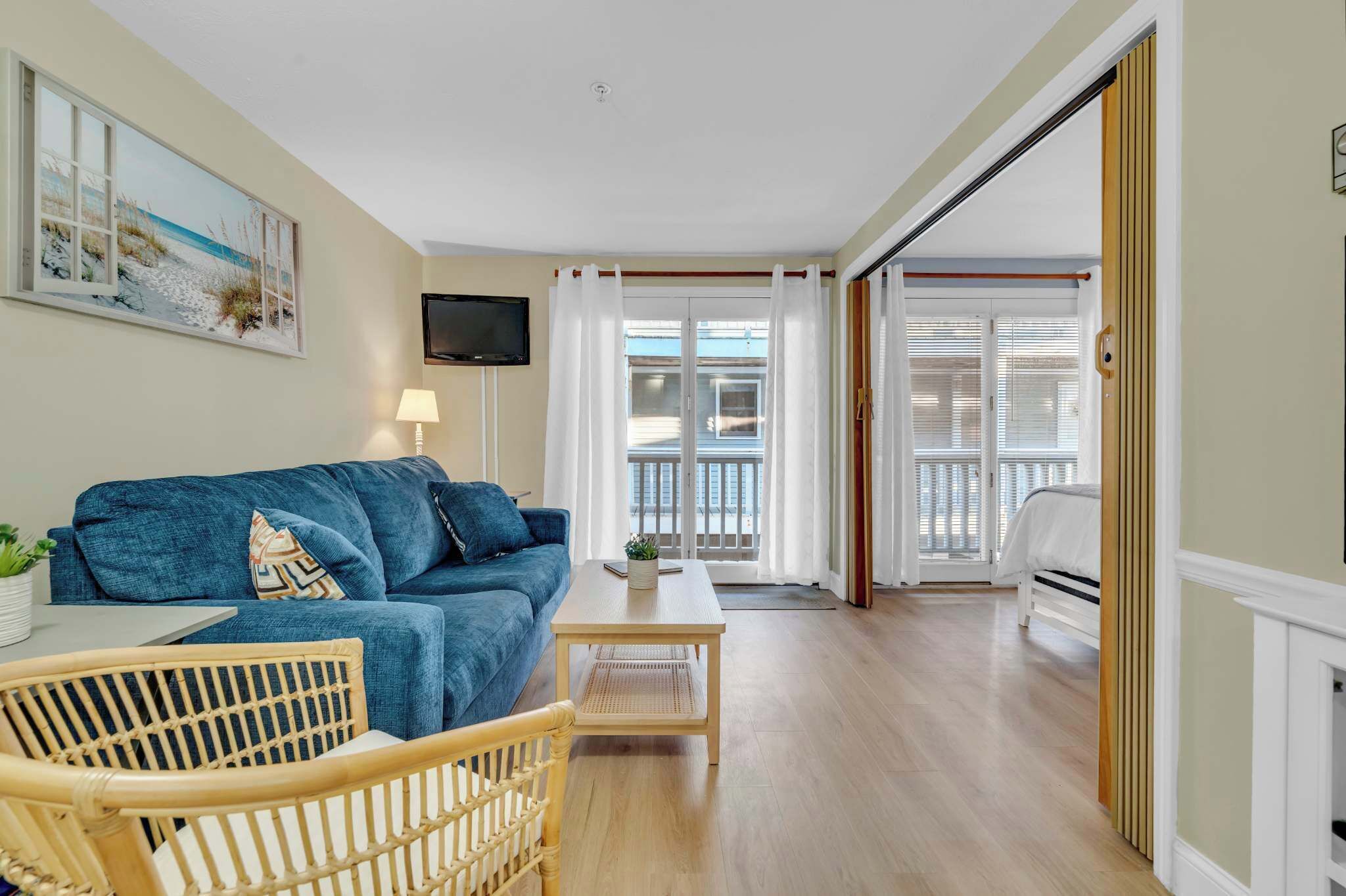 Condo, 1 King Bed with Sofa bed, Balcony (All is Wells) | Living area | 42-inch flat-screen TV with digital channels