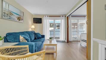 Condo, 1 King Bed with Sofa bed, Balcony (All is Wells) | Living area | 42-inch flat-screen TV with digital channels