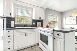 House, Multiple Beds, Kitchen, Garden View (Sunny Side Up) | Private kitchen | Fridge, microwave, oven, stovetop - Sunny Side Up A Charming Retreat! (Tampa)