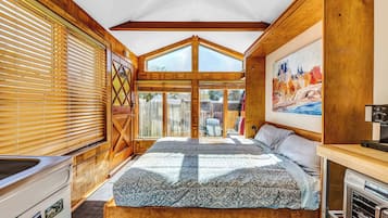 Studio, Patio, Garden View (Snuggle Inn) | 1 bedroom, individually decorated, individually furnished, bed sheets
