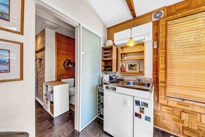 Studio, Patio, Garden View (Snuggle Inn) | Private kitchen | Stovetop, coffee/tea maker
