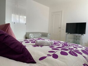 1 slaapkamer, een strijkplank/strijkijzer, wifi, beddengoed