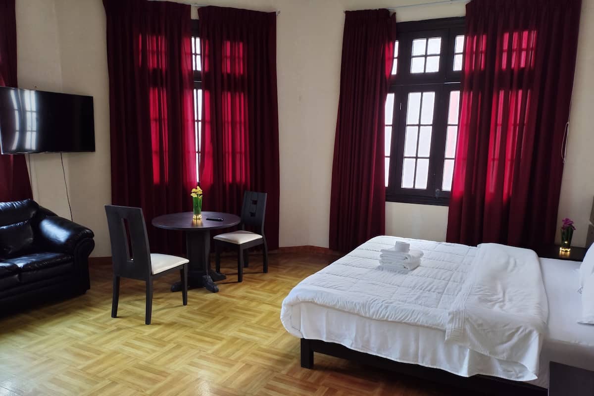 Suíte estúdio superior | 1 quarto, Wi-Fi de cortesia, roupa de cama