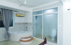 Shower, hair dryer, towels, soap