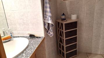 Hair dryer, towels, soap, shampoo