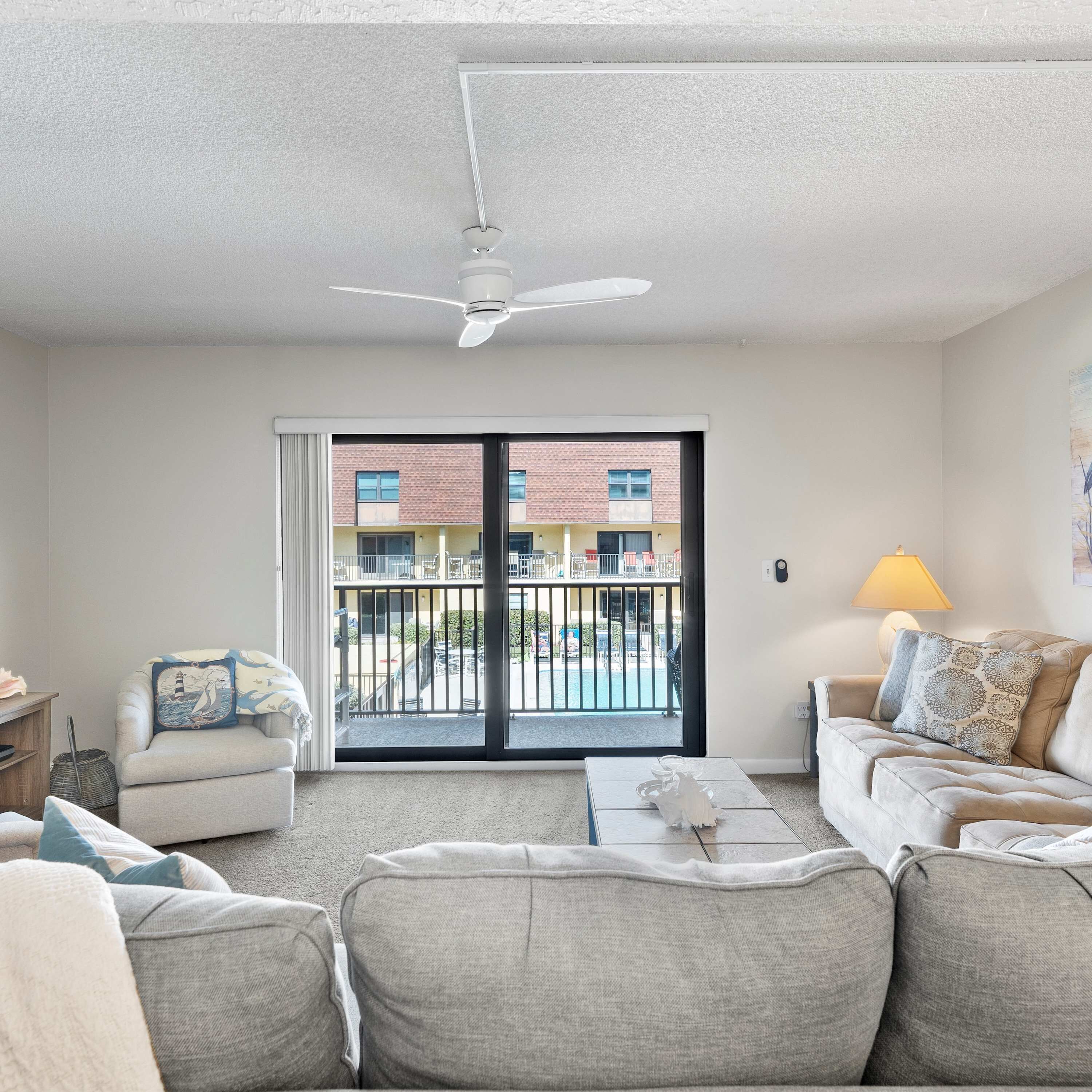 Condo, Multiple Beds, Balcony, Pool View (Wave Watcher at Cocoa Beach) | Living area | 42-inch flat-screen TV with digital channels