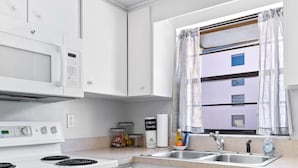 Condo, Multiple Beds, Balcony, Pool View (Wave Watcher at Cocoa Beach) | Private kitchen | Coffee/tea maker, fridge, microwave, oven - Wave Watcher at Cocoa Beach (Cocoa Beach)