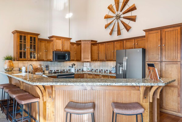 Condo, Multiple Beds, Balcony (Penthouse 7 on Taneycomo) | Private kitchen | Coffee/tea maker