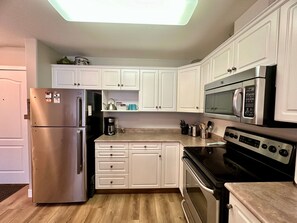 Fridge, microwave, oven, stovetop - Riverside Revive Condo w/ Boat Slip, Outdoor Pool & Hot Tub, Cozy Outdoor Patio (Sicamous)