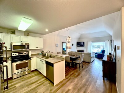 Riverside Revive Condo w/ Boat Slip, Outdoor Pool & Hot Tub, Cozy Outdoor Patio