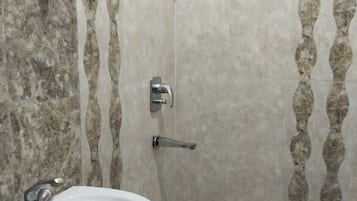 Shower, hair dryer, soap, shampoo