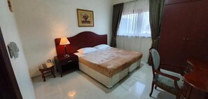 Standard Apartment | Premium bedding, in-room safe, soundproofing, iron/ironing board - Ivory Hotel Apartment (Abu Dhabi)