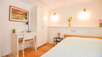 2 bedrooms, desk, iron/ironing board, travel crib