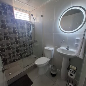 Shower, eco-friendly toiletries, towels, soap