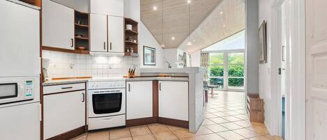 Fridge, stovetop, dishwasher, coffee/tea maker