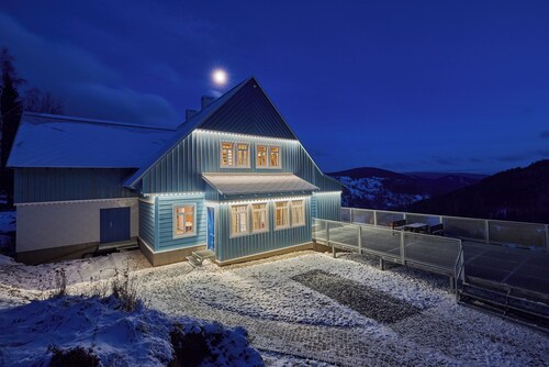 Stylish mountain cottage surrounded by Nature