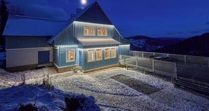 Stylish mountain cottage surrounded by Nature