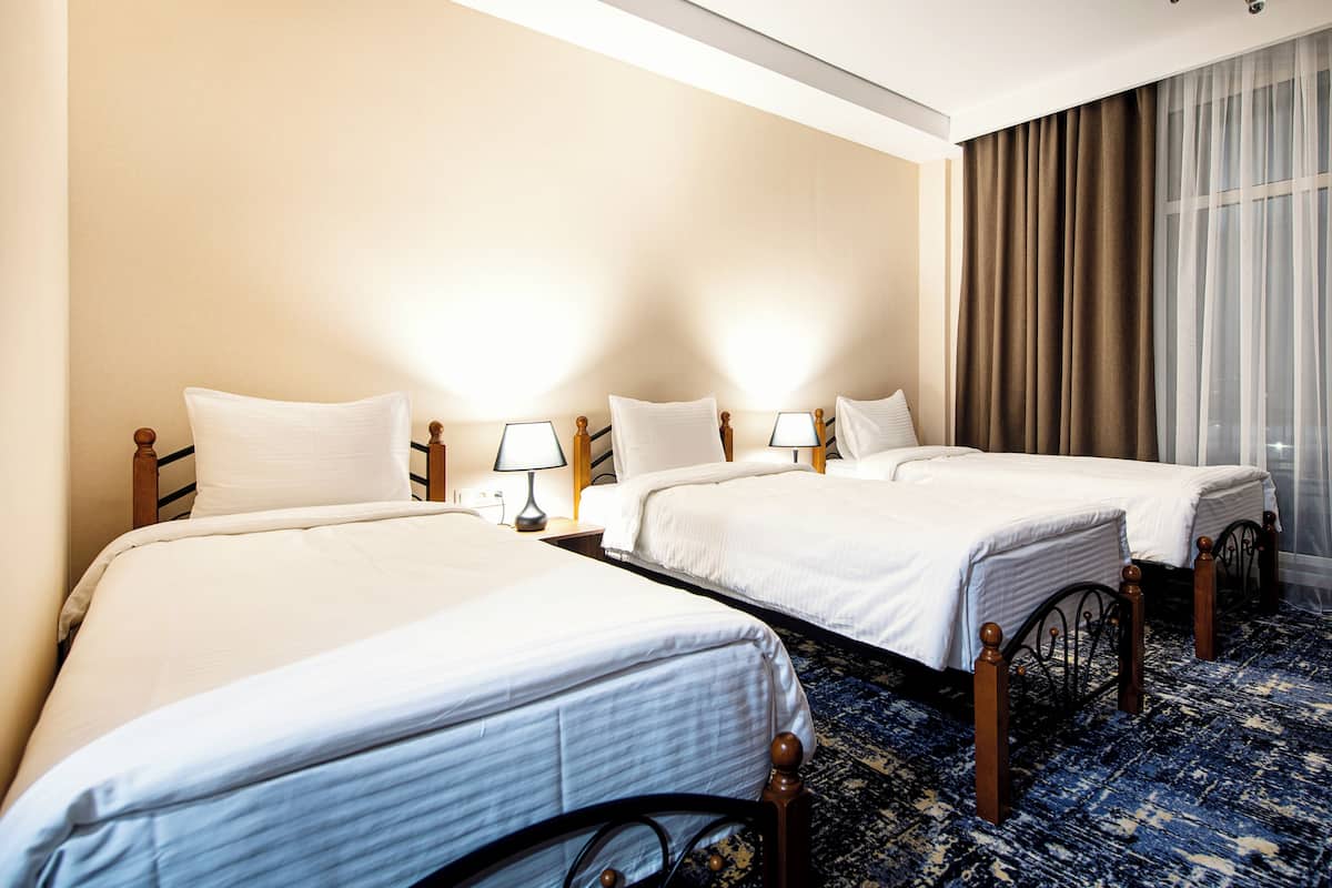 Quarto triplo standard, 1 quarto | Wi-Fi de cortesia