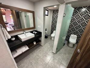 Shower, hair dryer, towels, soap