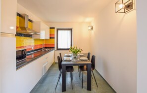 Fridge, microwave, cookware/dishes/utensils