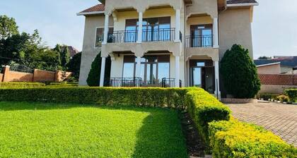 Kigali’s Hidden Gem: Quiet, Spacious Villa w/ Breathtaking Views by the Airport.