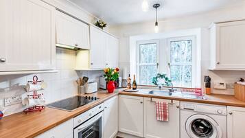 Fridge, microwave, oven, cookware/dishes/utensils