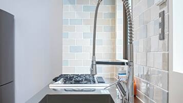 Fridge, microwave, stovetop, cookware/dishes/utensils