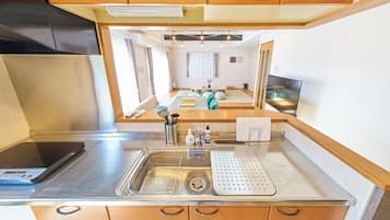 Fridge, microwave, stovetop, cookware/dishes/utensils