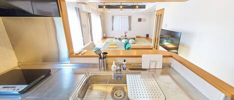 Fridge, microwave, stovetop, cookware/dishes/utensils