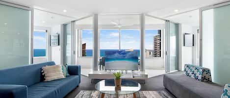 Family Apartment, 4 Bedrooms, Ocean View | Living area | Flat-screen TV