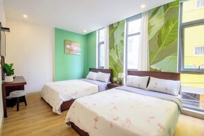 Superior Quadruple Room, City View | Premium bedding, minibar, individually furnished, desk - Dreamy Beach Boutique Hotel (Da Nang)