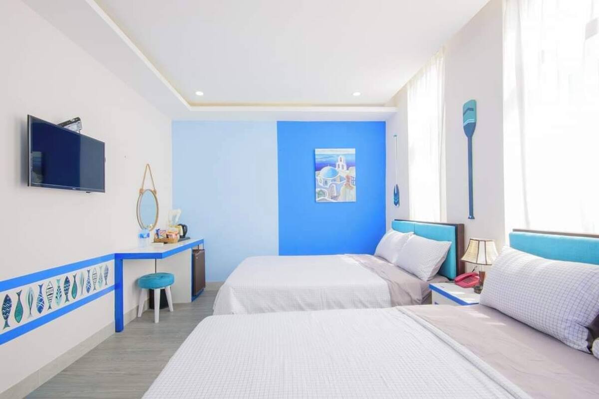 Quadrupla Superior, vista città | Biancheria da letto di alta qualità, minibar